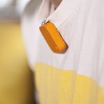 Miniature camera clipped onto shirt