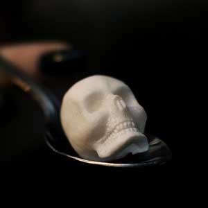 Sugar skull on spoon