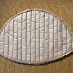 Curved seam of tea cozy from inside