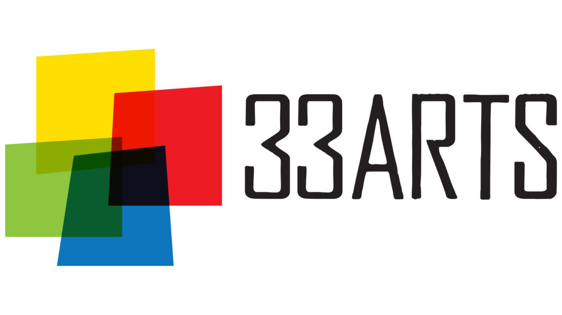 Four irregularly shaped four-sided areas of color (yellow, red, blue and green) overlap to create additional colors. To the right, "33ARTS" in black all-caps type in a dramatic sans serif typeface.