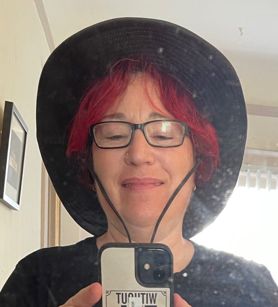 Me with bright red hair and my new Adventurin' Hat!