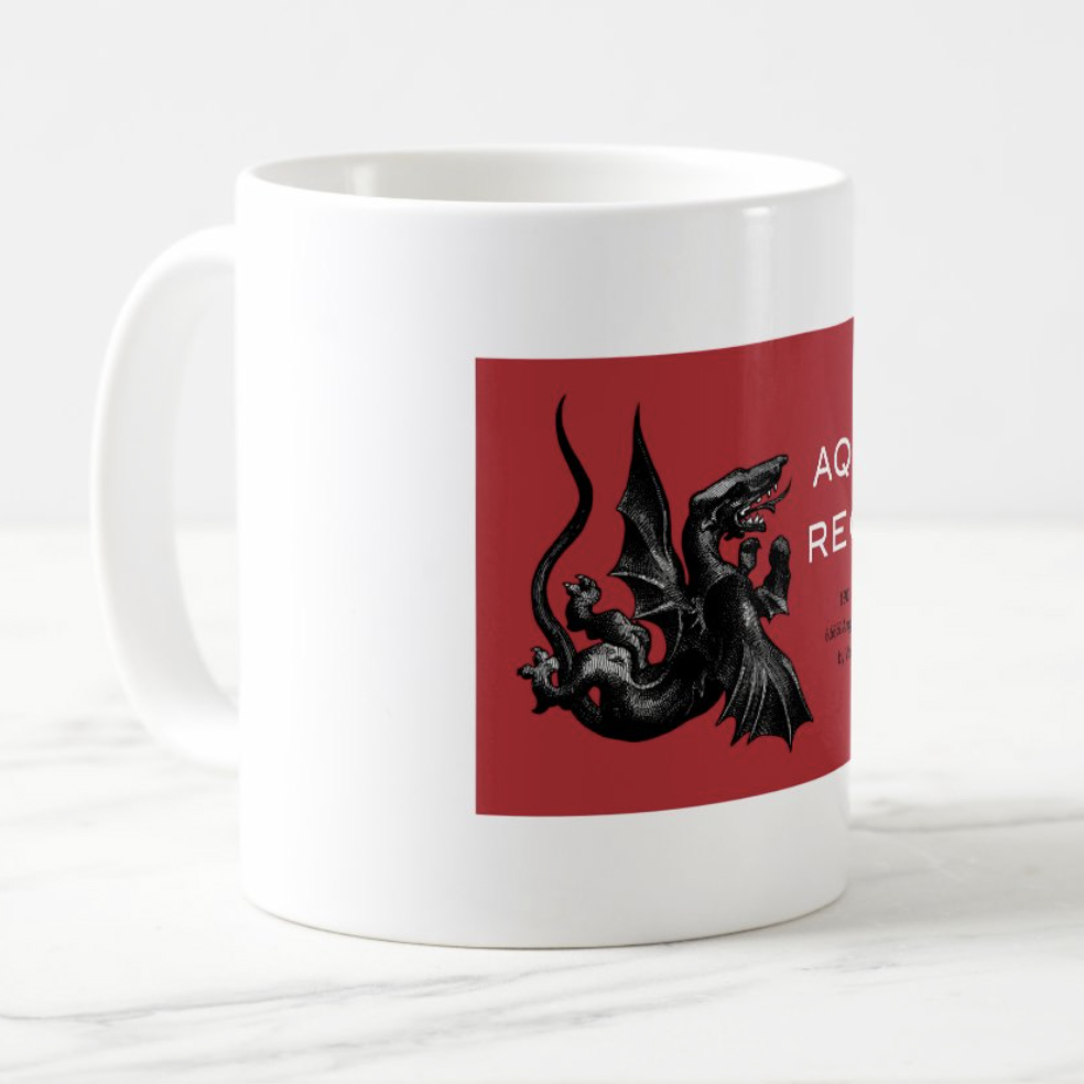 Aqua Regia logo on white mug, left view