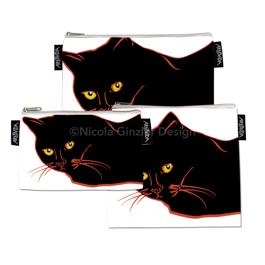 Three zippered pouches of different sizes with cat image on white background. Only head of cat is visible. Cut paper-style digital illustration of a black cat lying down, looking directly at the viewer. The cat has a jagged red outline, yellow-green eyes, and red whiskers.