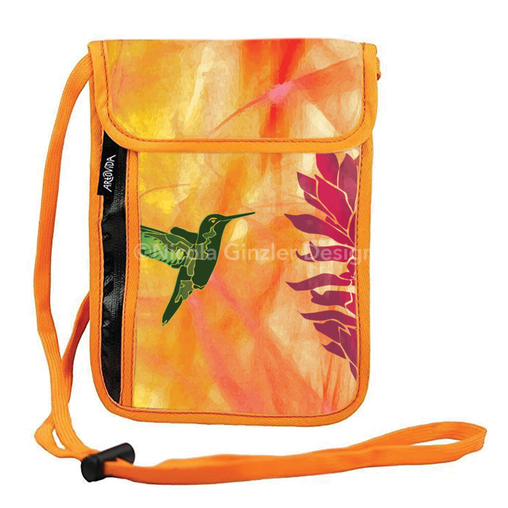 Bag with flap and long strap with hummingbird image on white background. Brightly colored digital illustration of a green hummingbird poised next to a red ginger flower. The background is a vibrant mix of oranges and yellows.