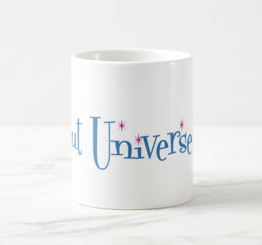 White ceramic mug with Donut Universe logo, center view, on a marble counter.