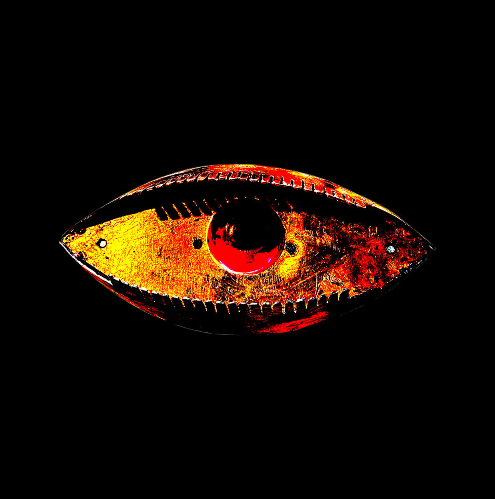 Posterized photo of fabricated metal copper-colored eye with red resin center as an iris, against black background.