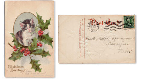Yellowed vintage 1906 illustrated postcard. Front: a black and white kitten with a green ribbon around its neck. The kitten is in a light blue vertical oval with a gold border, and holly leaves with red berries below it. In the bottom left is "Christmas Greetings" in gold type. In pencil in the center bottom is "From Adrian [?] Hallowell." In the bottom right is the manufacturer's information in faint blue print: "Copyright 1906 by H. J. Robbins, Boston." Back: addressed in faded black ink to "Master Ralph Springman, Palmyra, Nebr." Postmark is "Lincoln, Neb. - Dec. 24, 1906 - 11 AM." A green 1-cent stamp is cancelled with wavy black lines over red type that says "Post Card."